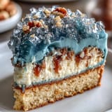 Teal and gold geode graduation cake featuring a stunning slice design, ideal for festive celebrations.