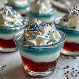 Festive alcohol-free Jello shots, perfect for Independence Day celebrations.